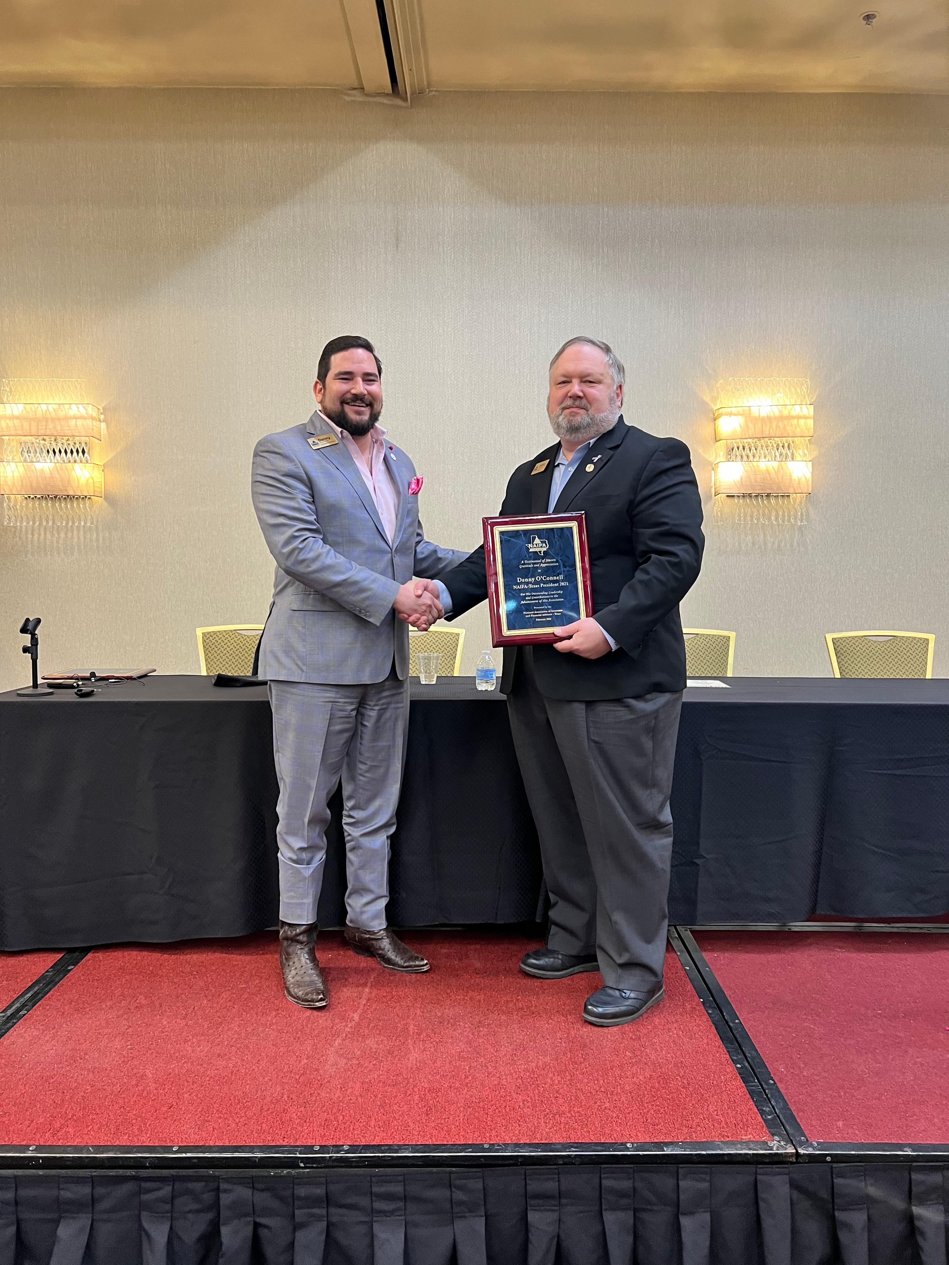 Danny OConnell presented with Past Presidents Plaque